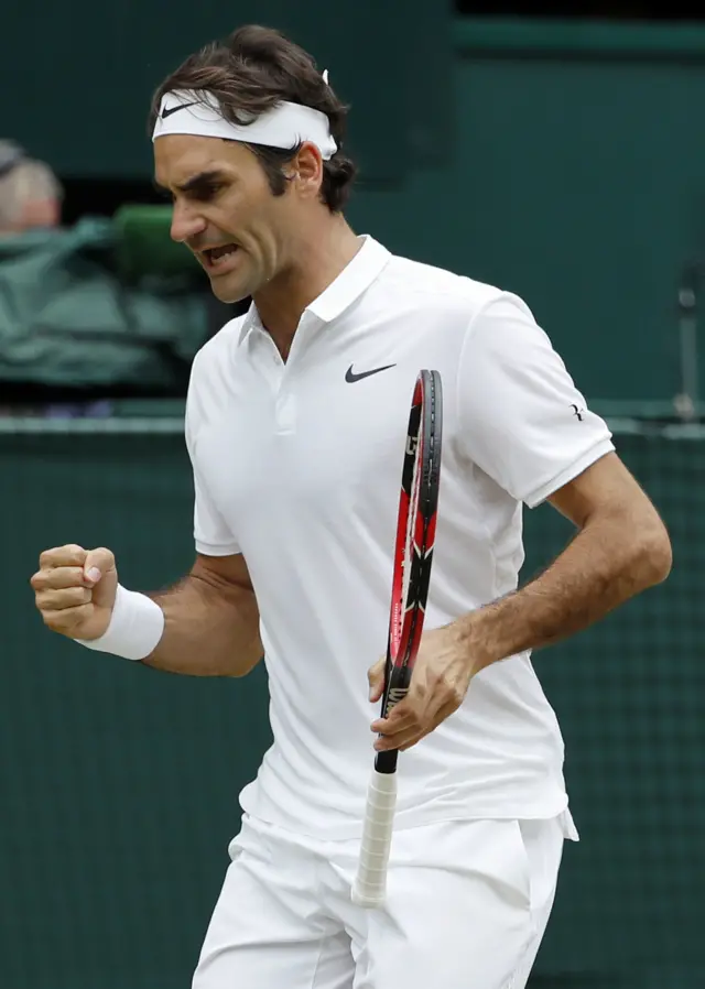 Roger Federer celebrates