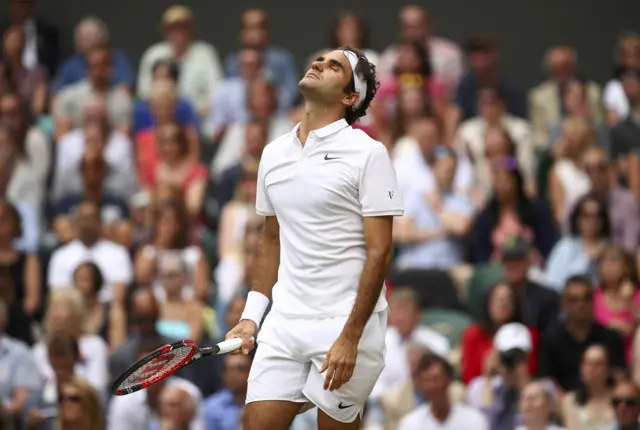 Roger Federer looks dejected