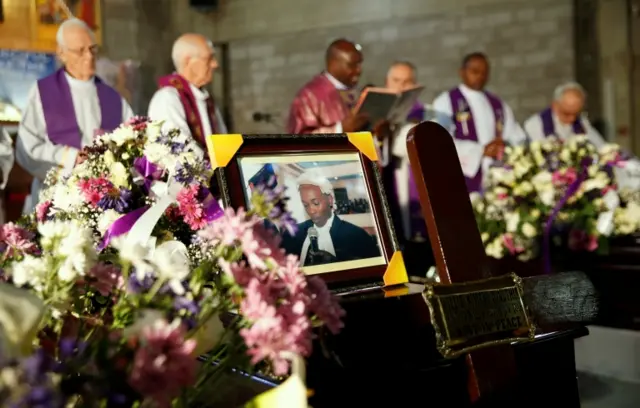 Casket with picture of Kimani on it