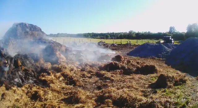 Straw bales damaged by fire