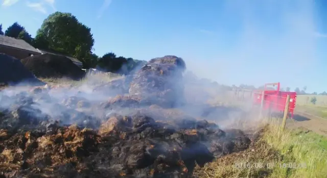 Straw bales damaged by fire