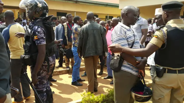 Police outside a court in Kampala, Uganda