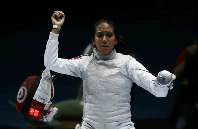 Ines Boubakri of Tunisia celebrates winning the match