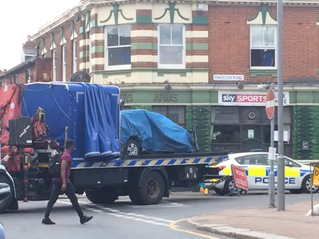 Car removed from shop front