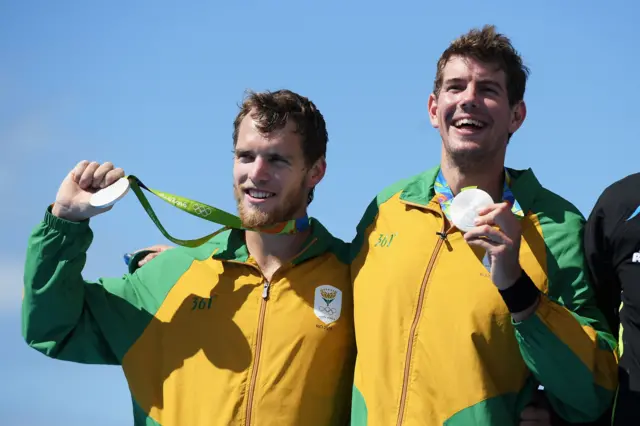 awrence Brittain of South Africa and Shaun Keeling of South Africa celebrate winning the silver medal in the Men's Pair Final A on Day 6 of the Rio 2016 Olympic Games at the Lagoa Stadium on August 11, 2016 in Rio de Janeiro, Brazil.