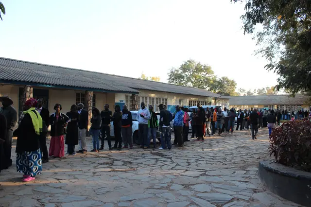 Zambians queuing