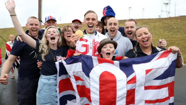 Joe Clarke celebrates winning Olympic gold