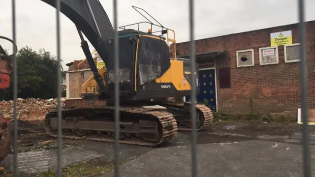 The Queen of Hearts Pub being demolished