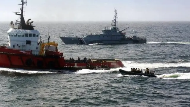Hamal being stopped by Royal Navy and Border Force officials