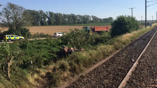 Car involved in level crossing incident