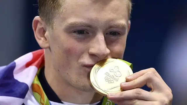 Adam Peaty with gold medal