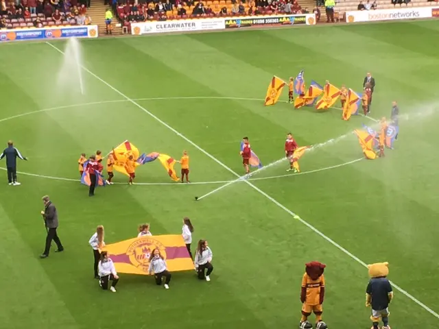 Commentator John Barnes sent this photo in from Fir Park where some local children got a surprise soaking when the sprinklers came on.