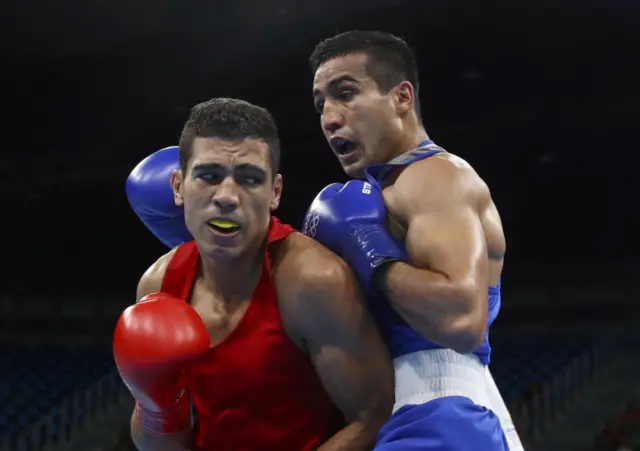 Mohammed Rabii (MAR) of Morocco and Shakhram Giyasov (UZB) of Uzbekistan compete