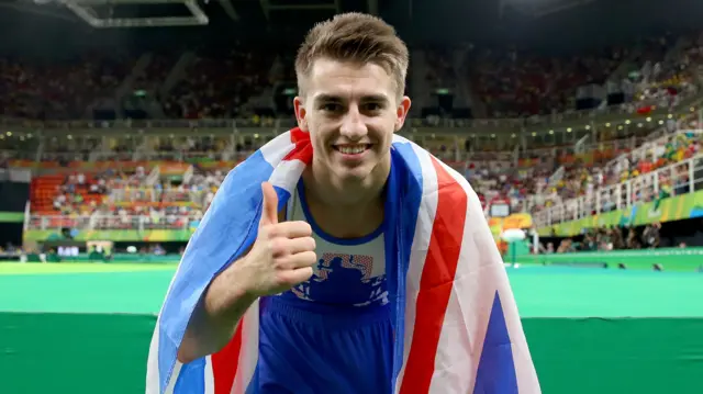 Max Whitlock gives thumbs up to camera