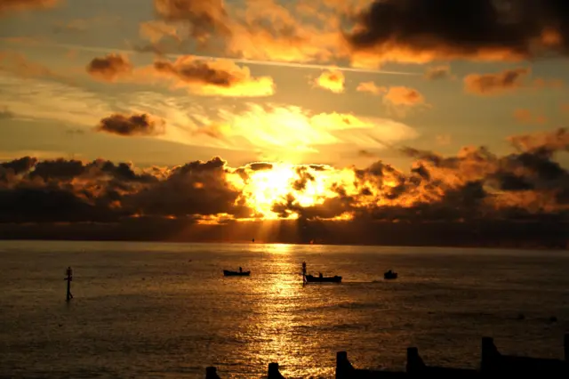 Sheringham sunrise, with a few fishing boats