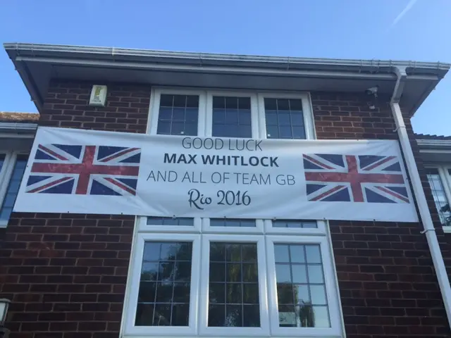 Nursery with banner saying "good luck Max"