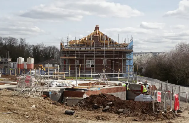 Building site, with house building