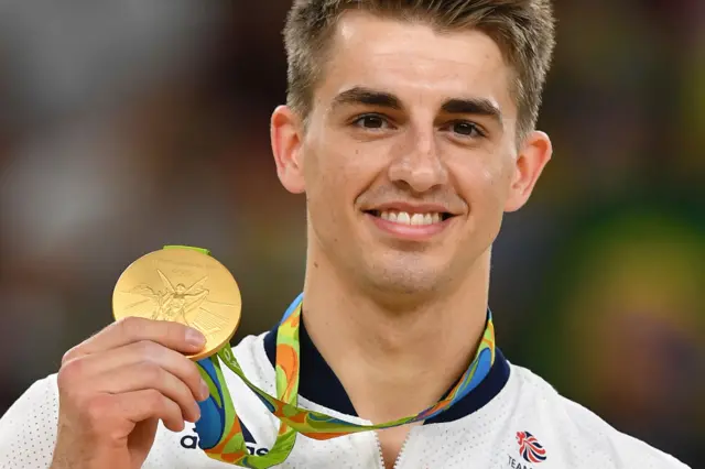 Max Whitlock holds gold medal