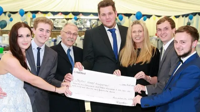 Student Association Vice President Katie Gibson, RAG Vice Chair Dan Lee, Student Association Joint Vice President Josh Bufton, RAG Chair Tom Allen and SA President Rob Sparkes hand over cheque to British Heart Foundation