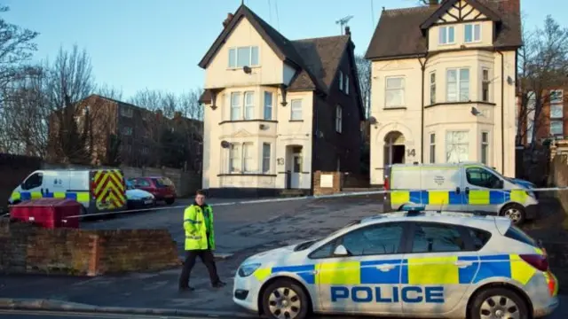 Police outside Atul Shah's Luton home