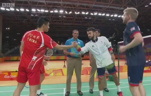 Great Britain's Marcus Ellis and Chris Langridge and China's Fu Haifeng and Zhang Nan