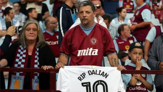 Supporters held a minute's applause 10 minutes into the game at Villa Park