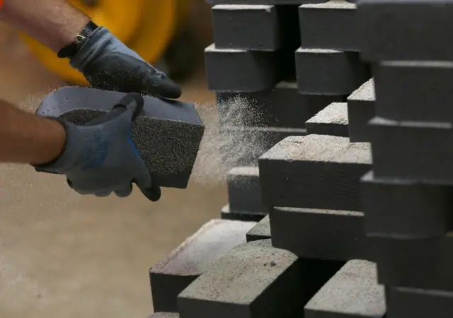 Wienerberger worker packs bricks