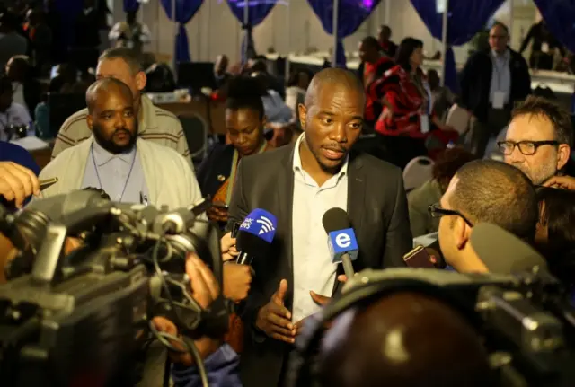 Democratic Alliance leader Mmusi Maimane gestures as he speaks to members of the media at the result center in Pretoria, South Africa August 4,2016.