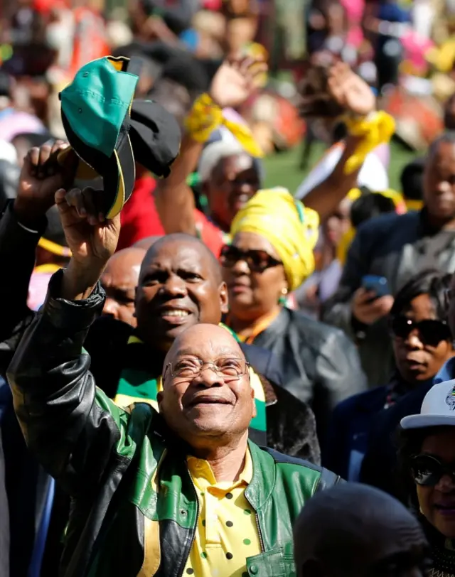 President Jacob Zuma waves to his supporters as he arrives for the African National Congress" (ANC) traditional Siyanqoba rally ahead of local municipal elections in Johannesburg, South Africa July 31, 2016.