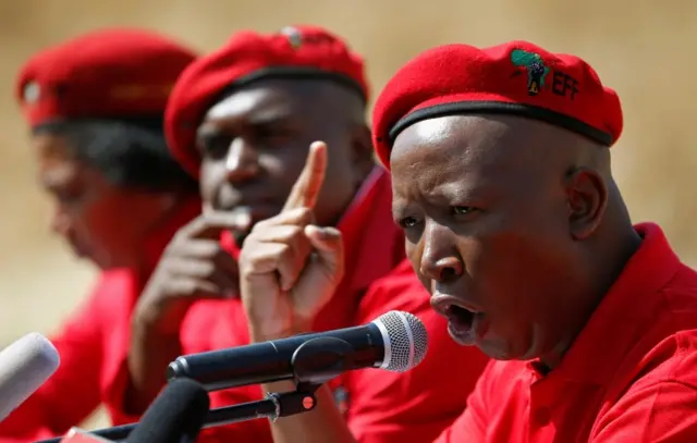 Julius Malema, leader of South Africa"s Economic Freedom Fighters (EFF), gestures during a media briefing in Alexander township near Sandton, South Africa August 17, 2016