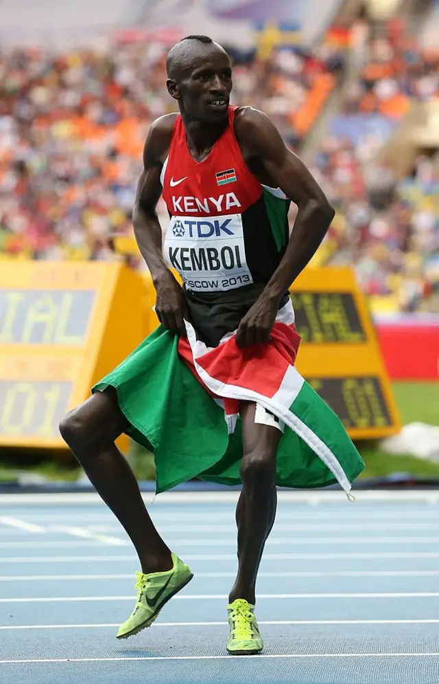 Kenya's Ezekiel Kemboi celebrates after winning the men's 3000 metres steeplechase final at the 2013