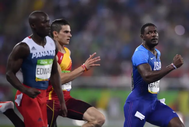 Justin Gatlin (right) was third in his 200m semi-final