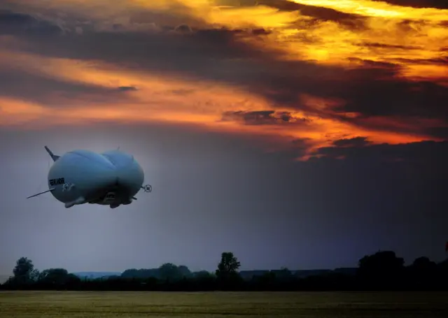 Airlander 10 in flight over Cardington airfield during sunset