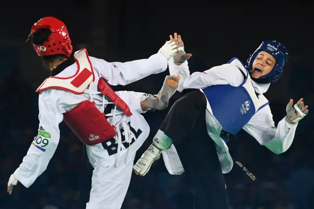 Belgium's Raheleh Asemani (L) competes against Egypt's Hedaya Wahba during their womens taekwondo bronze medal bout in the -57kg category as part of the Rio 2016 Olympic Games, on August 18, 2016, at the Carioca Arena 3, in Rio de Janeiro.