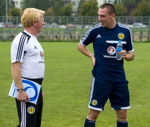 Scotland manager Gordon Strachan shares some tactical chat with Scott Brown