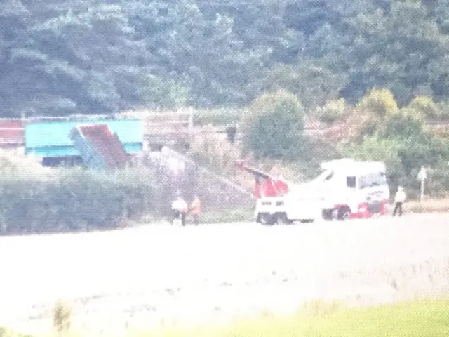 Trailer stuck under the rail bridge