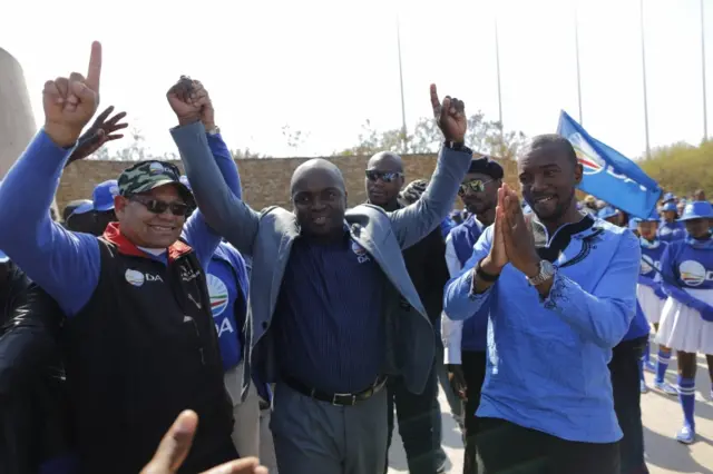 New major of Tshwane, Solly Msimanga (C) of the DA (Democratic Alliance) together with national leader, Mmusi Maimane (R) arrive at a victory rally held at Freedom Park, Pretoria, South Africa, 09 August 2016