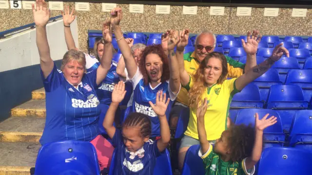 Katie Boothe and Beth Howman with their families