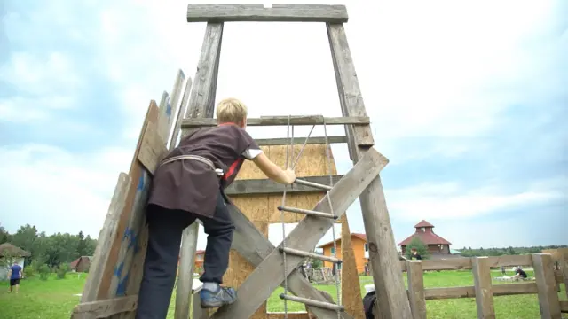 a child climbing a fort