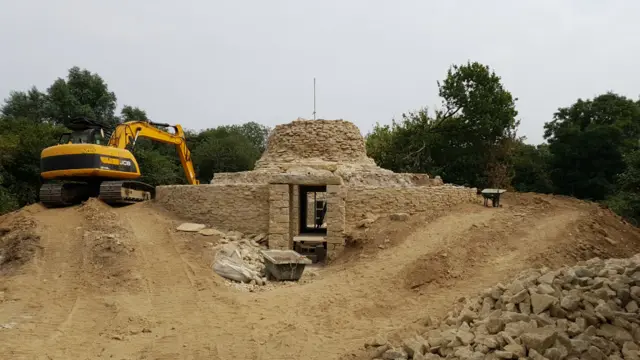 Burial barrow being constructed