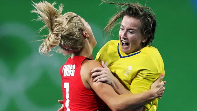 Great Britain's Georgie Twigg (left) and keeper Maddie Hinch