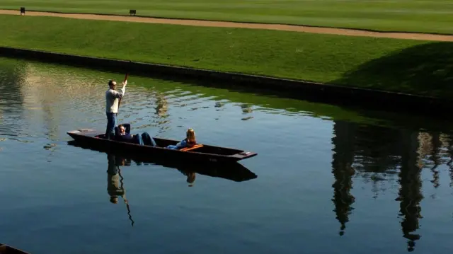 Students punting in Cambridge