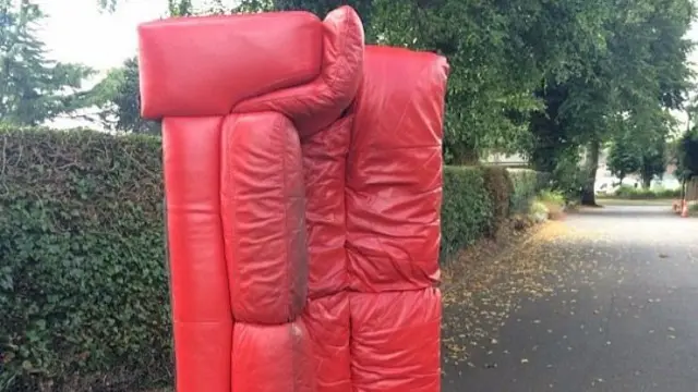 Red sofa on its side