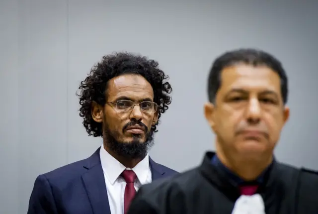 16 AFP/Getty Images (FILES) This file photo taken on September 30, 2015 shows alleged Al-Qaeda-linked Islamist leader Ahmad Faqi Al Mahdi (L) looking on in the courtroom of the International Criminal Court (ICC) in The Hague.