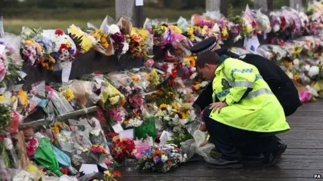 Floral tributes at Shoreham toll bridge