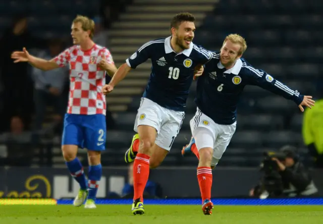 Robert Snodgrass celebrates scoring against Croatia