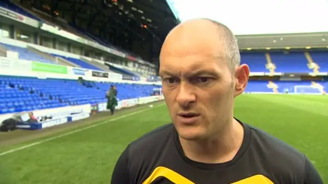 Alex Neil, on the Ipswich Town pitch