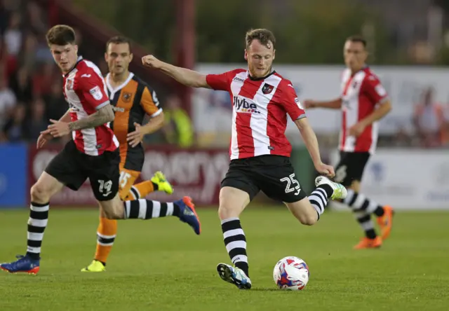 Jake Taylor of Exeter City scores their first goal