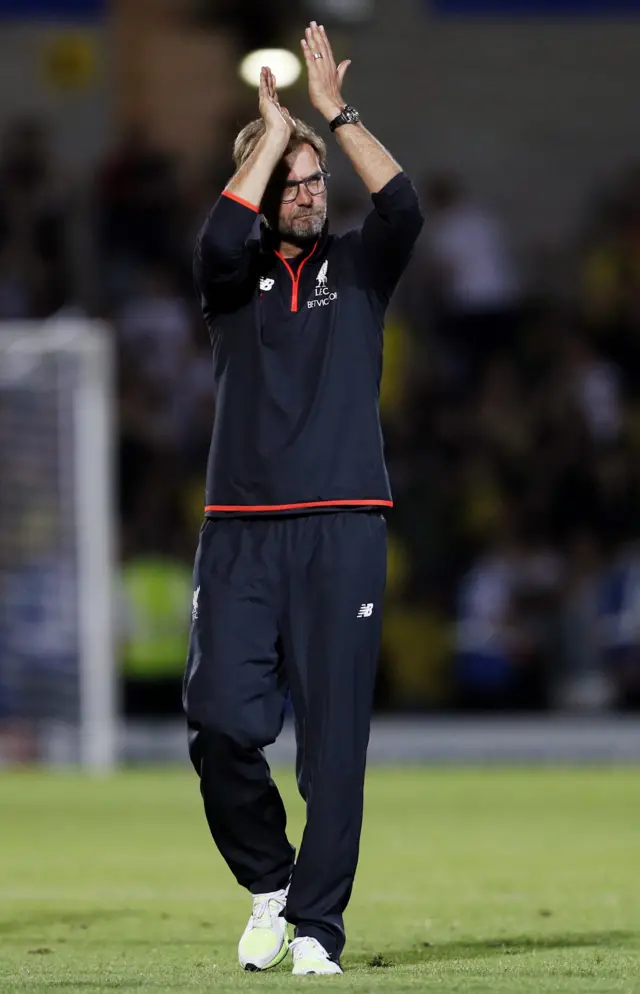 Liverpool manager Juergen Klopp applauds the fans