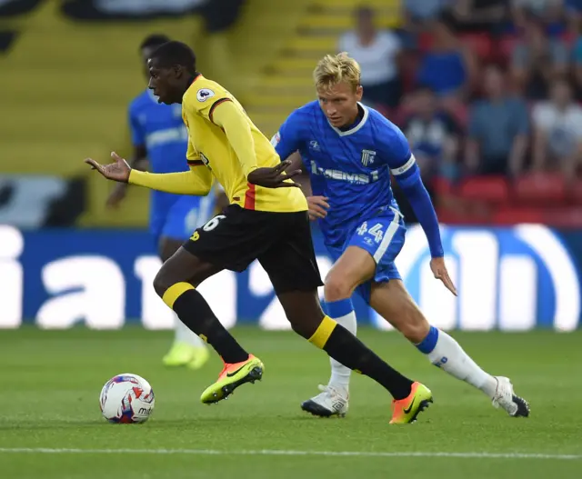 Watford's Abdoulaye Doucoure and Gillingham's Josh Wright